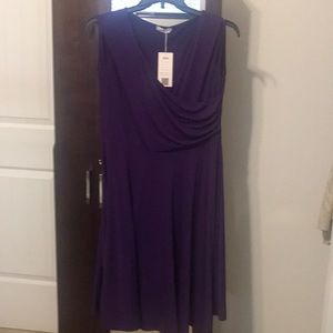 Cool, sleeveless, wrap look dress.